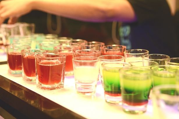 close-up-of-drinks-on-bar-counter-at-nightclub